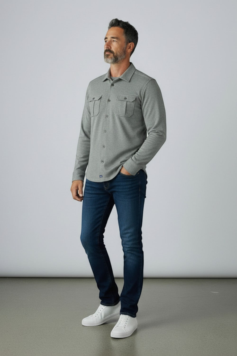 Broderick's Clothing Co. Johnnie-O grey twill overshirt with dual chest pockets worn by a man with blue jeans