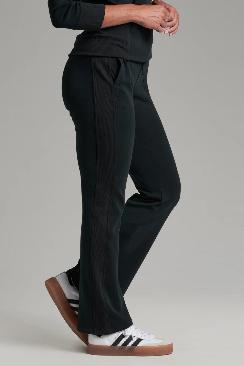 Broderick's Clothing Co. KÜHL Kozy black fleece-backed knit pants with rib paneling and pull-on waistband