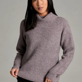 Broderick's Clothing Co. KÜHL Sienna heathered mauve chunky knit sweater with a ribbed cowl neck and raglan sleeves.