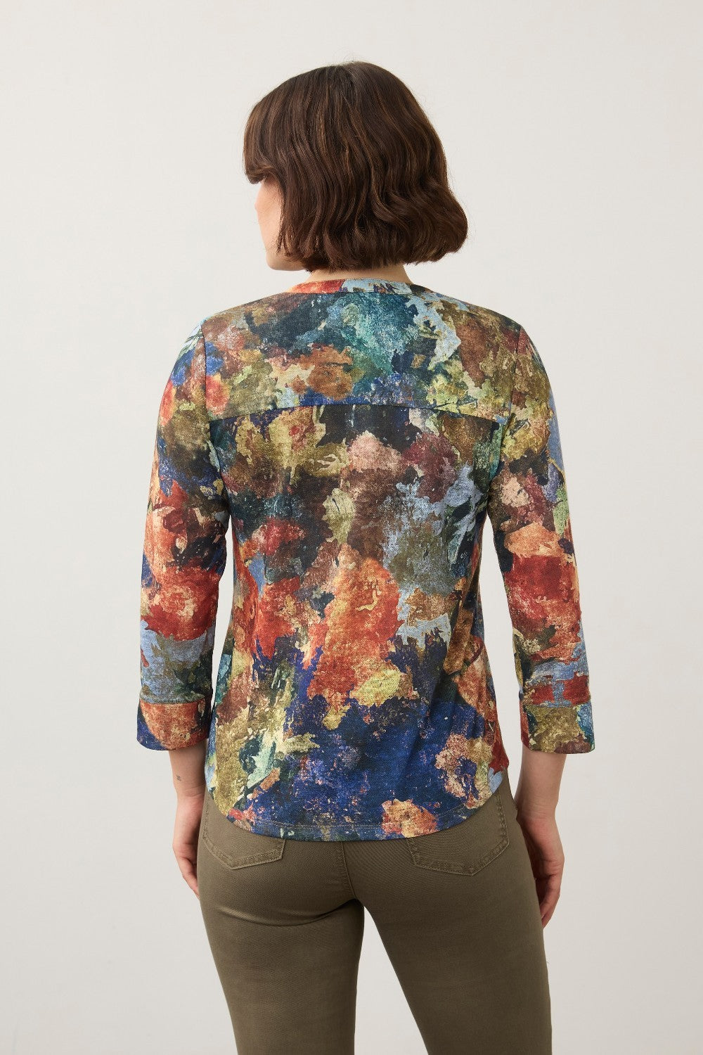 Back view of Broderick's Clothing Co. FDJ 3/4 sleeve henley top featuring a vibrant multi-colour abstract print