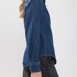 Broderick's Clothing Co. Angie denim shirt in medium-wash blue with princess seams and a relaxed fit on a model