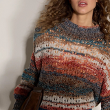 Broderick's Clothing Co. apricot mixed yarn boho jumper with open-knit stripes, mock neck, and oversized fit.