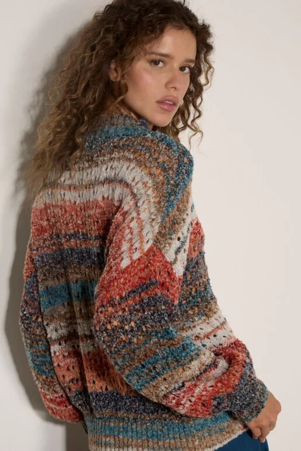 Broderick's Clothing Co. apricot mixed yarn boho jumper with open-knit stripes, mock neck, and oversized fit.