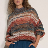 Broderick's Clothing Co. apricot mixed yarn boho jumper with open-knit stripes, mock neck, and oversized fit.