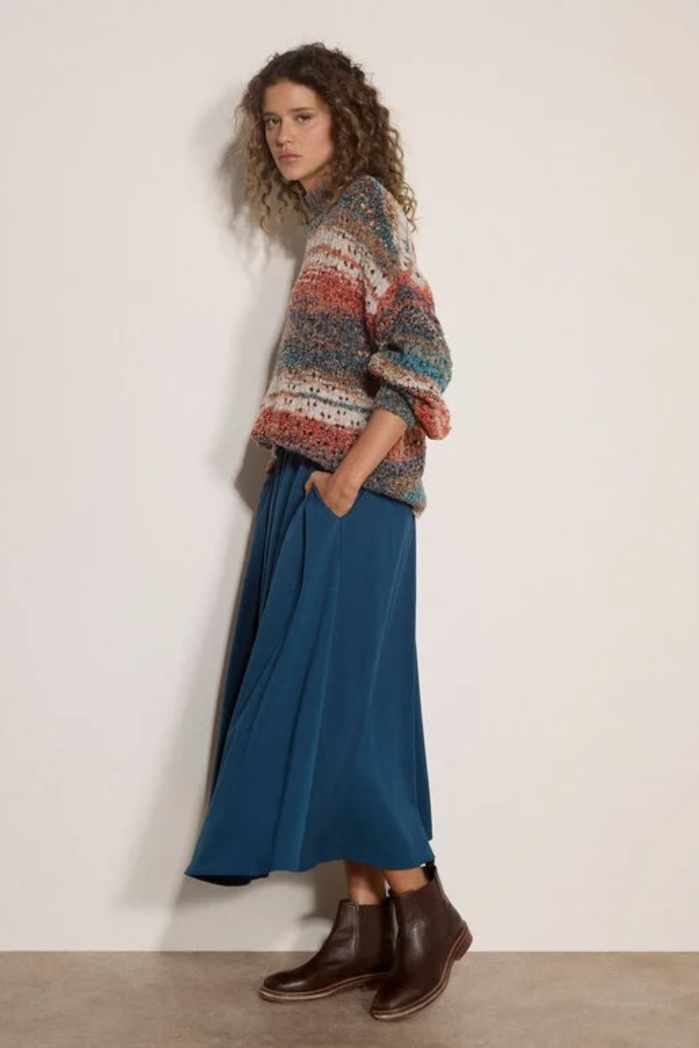 Broderick's Clothing Co. apricot mixed yarn distressed boho jumper with mock neck and dropped shoulders on a model