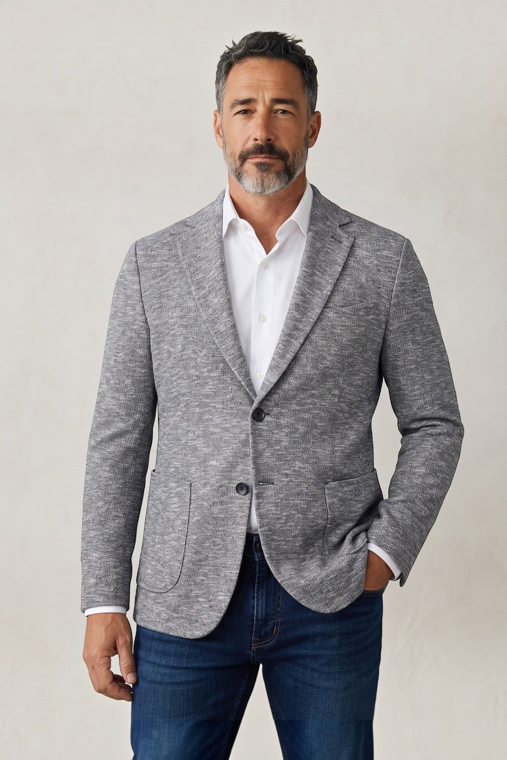 Broderick's Clothing Co. 7 Downie St. Arlington heathered grey knit blazer with notch lapels on a male model.