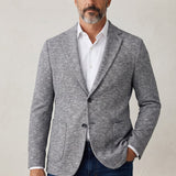 Broderick's Clothing Co. 7 Downie St. Arlington heathered grey knit blazer with notch lapels on a male model.