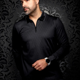 Man wearing a black Au Noir AVENOR long sleeve knit polo with a structured collar from Broderick's Clothing Co.