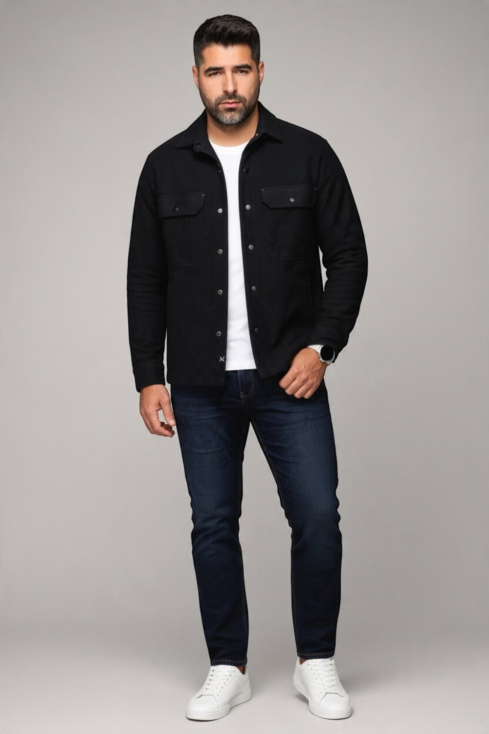 Broderick's Clothing Co. Au Noir GRADO black button-up overshirt worn by a man with a white t-shirt and dark jeans.