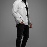 Broderick's Clothing Co. Au Noir GRADO white structured overshirt worn over a black hoodie and dark jeans
