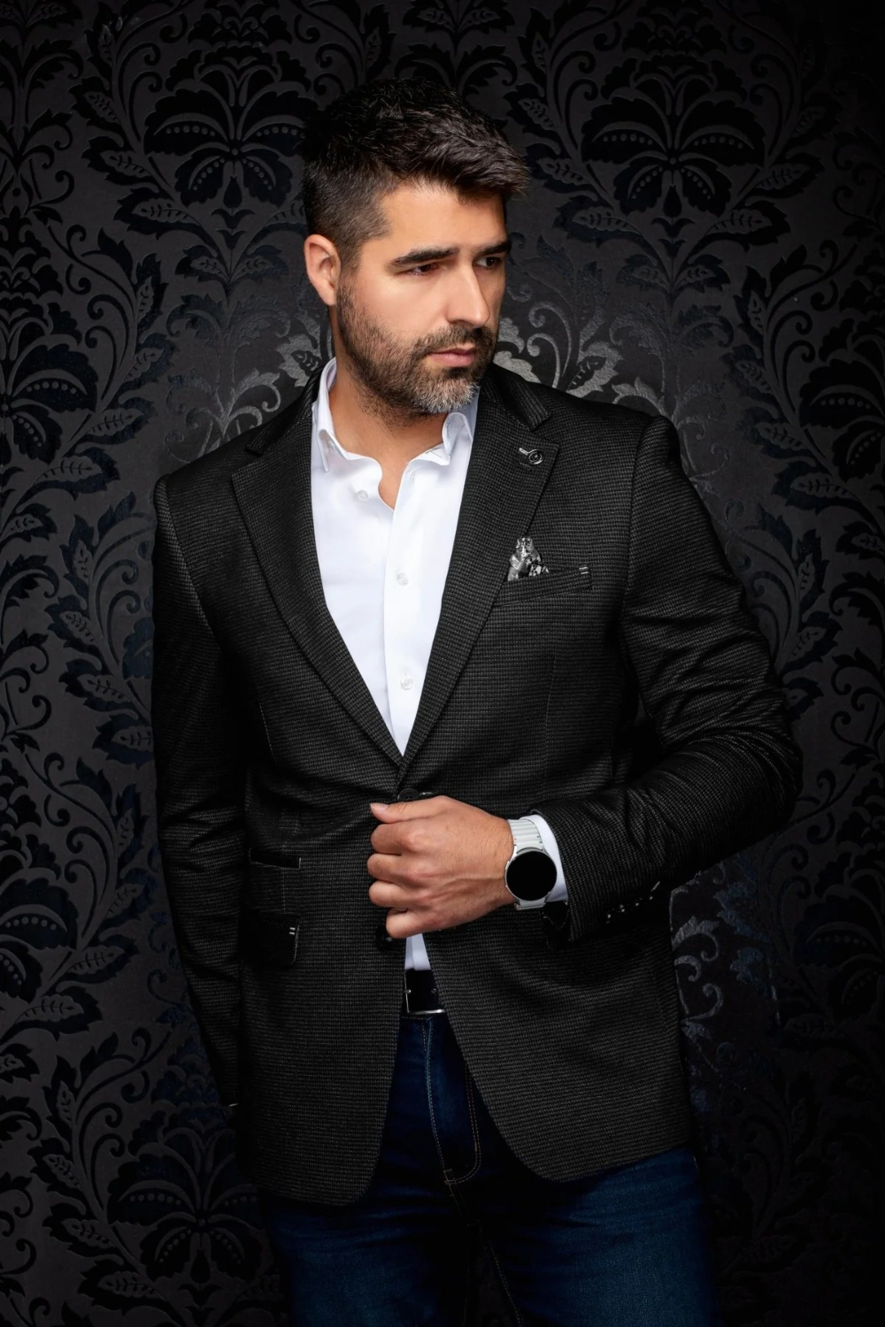 Broderick's Clothing Co. Au Noir SCARPA blazer in black textured fabric worn by a man with a white shirt and jeans