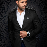 Broderick's Clothing Co. Au Noir SCARPA blazer in black textured fabric worn by a man with a white shirt and jeans
