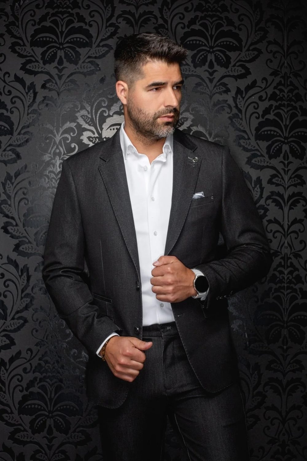 Broderick's Clothing Co. Au Noir Sullivan charcoal grey single breasted blazer with flap pockets on a man