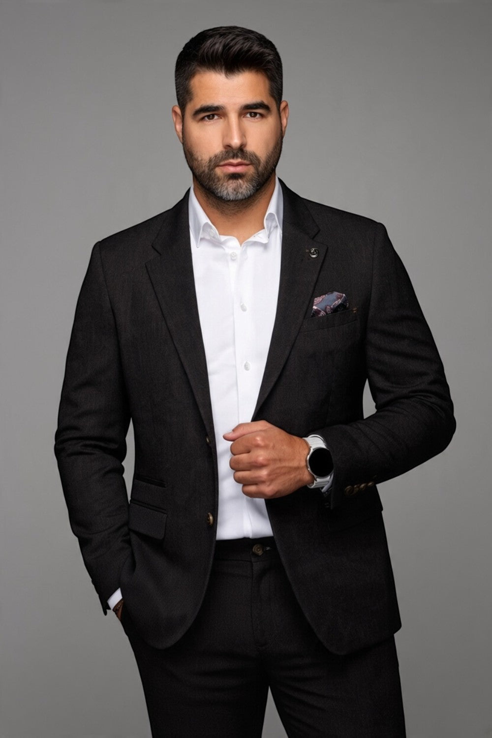 Broderick's Clothing Co. Au Noir TYCHO charcoal grey blazer worn by a bearded man with a white shirt and pocket square