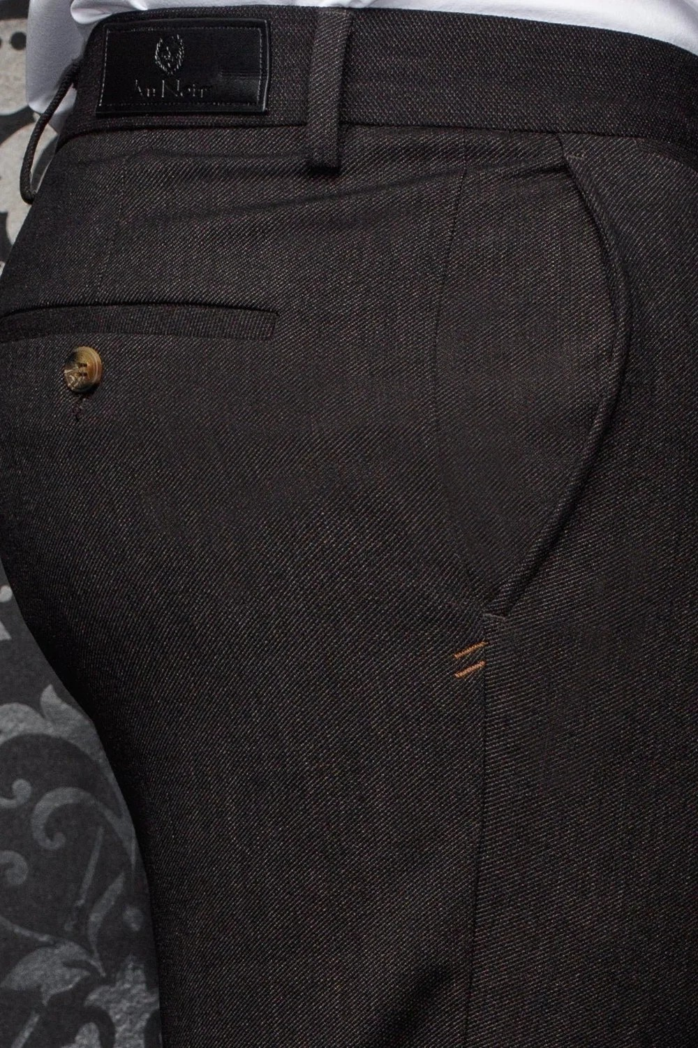 Broderick's Clothing Co. Au Noir TYCHO-WESSON dark brown textured trousers with buttoned back pocket detail.