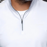Broderick's Clothing Co. Au Noir white mock neck knit pullover with a quarter-zip closure and subtle knurling detail.