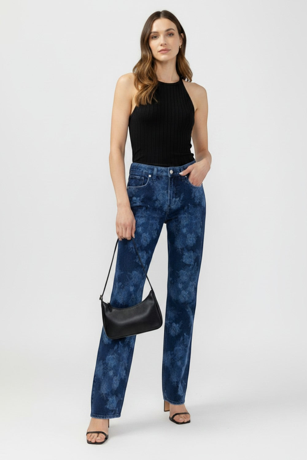 Broderick's Clothing Co. Avery relaxed straight leg jeans in blue floral denim with a high-rise contoured waistband.