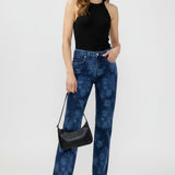 Broderick's Clothing Co. Avery relaxed straight leg jeans in blue floral denim with a high-rise contoured waistband.