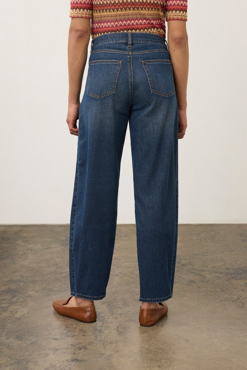 Broderick's Clothing Co. FDJ Girlfriend Barrel Ankle jeans in dark blue denim with a relaxed fit and cropped hem.