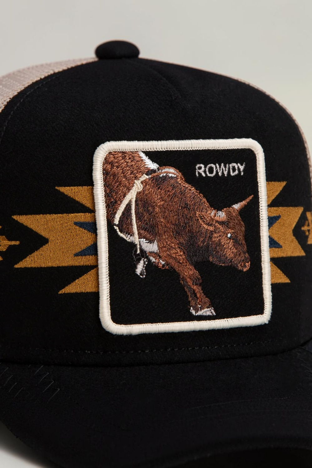 Broderick's Clothing Co. Goorin Bros. black trucker hat with a bull patch and desert-inspired embroidery detail.