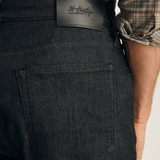 Broderick's Clothing Co. 34 Heritage Courage black sporty denim jeans featuring a leather brand patch on the back.
