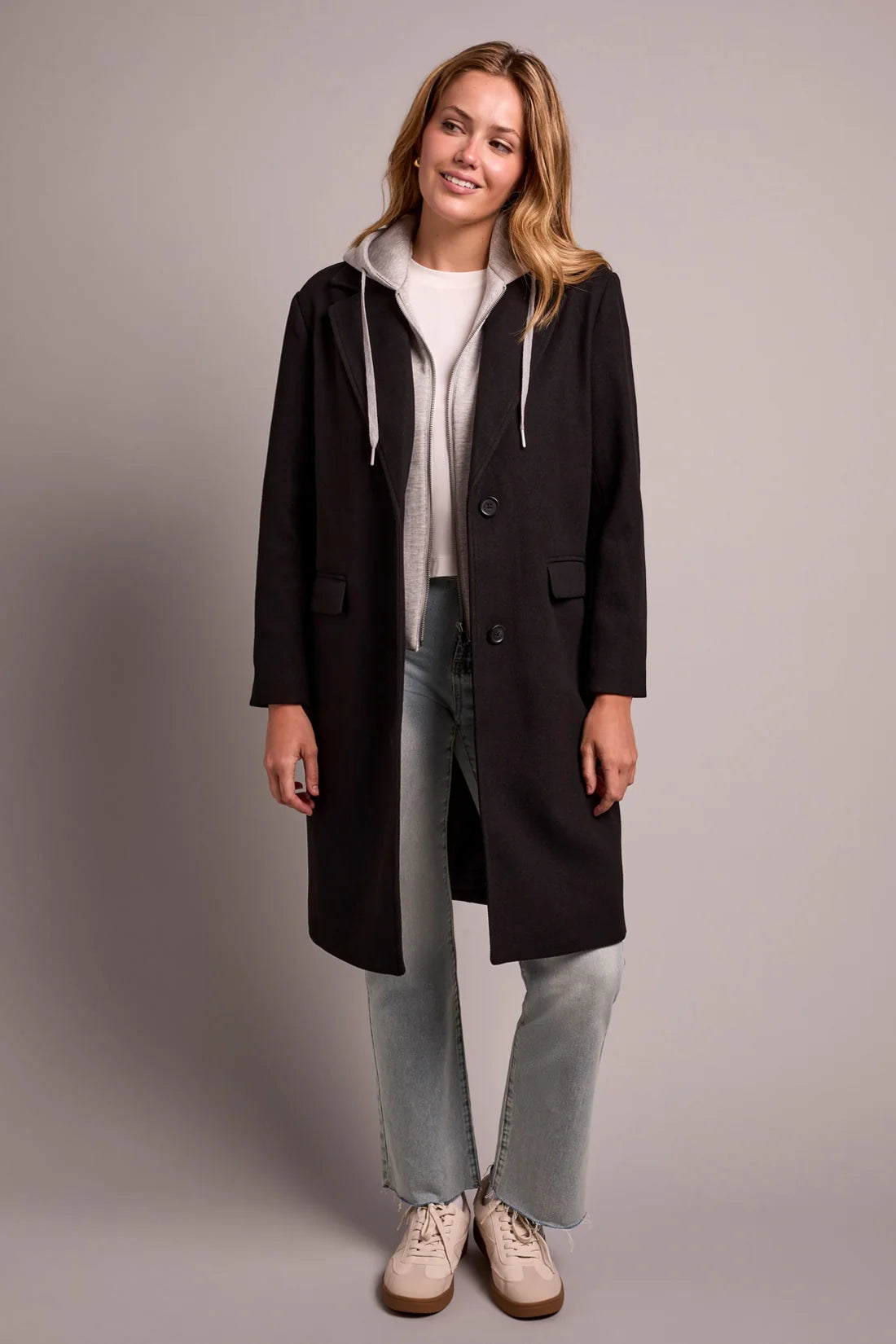 Broderick's Clothing Co. black knit car coat with a removable grey fooler hoodie, notch lapels, and button closure.