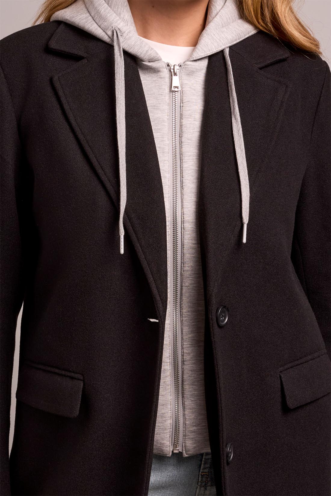 Broderick's Clothing Co. black knit car coat featuring a removable grey jersey fooler hoodie and notch lapels.
