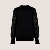 Broderick's Clothing Co. black jumper with crew neck, lettuce trim, and intricate guipure lace mesh sleeves.