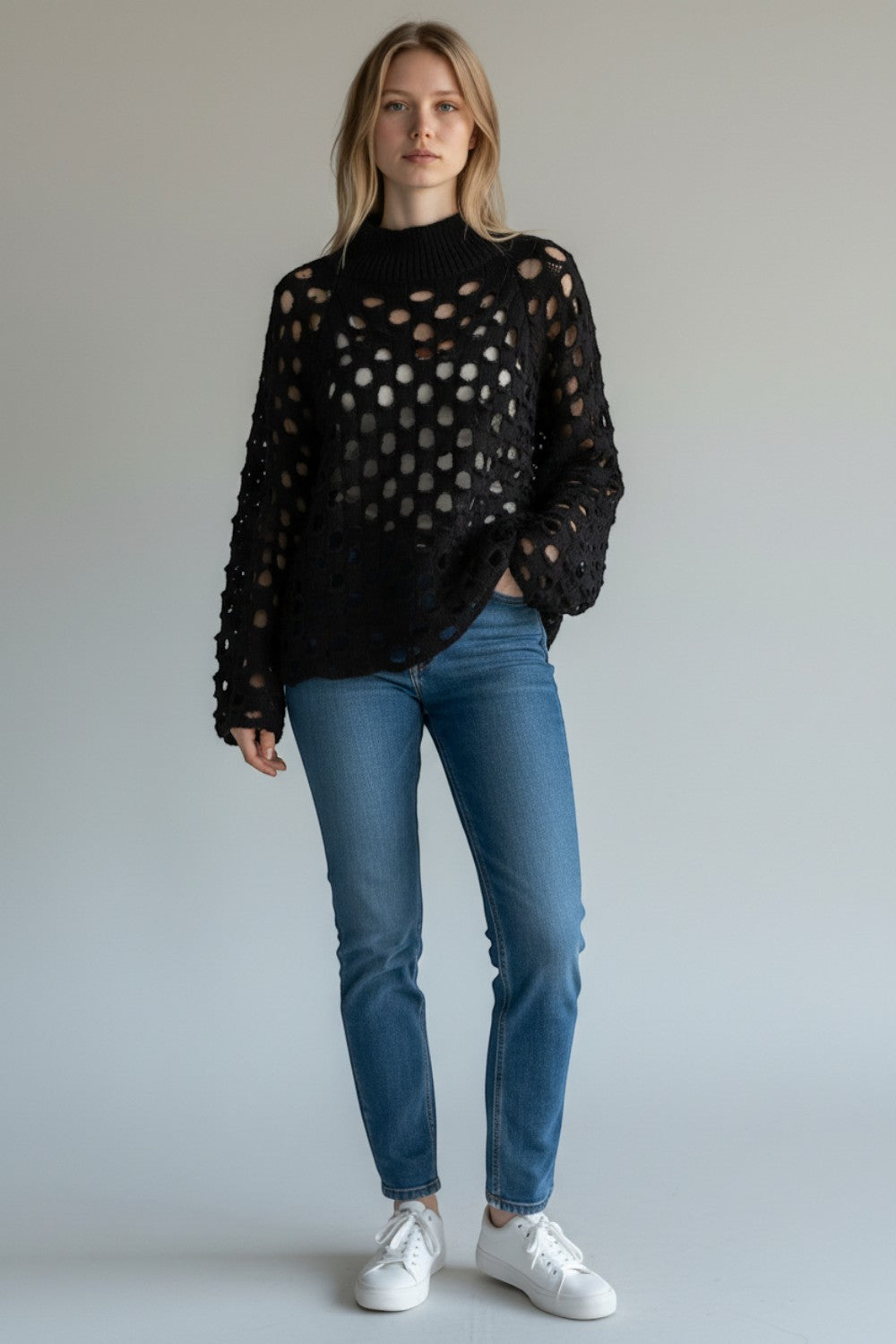 Broderick's Clothing Co. Shannon Passero Tara black open-knit sweater with circular cutouts and high neck