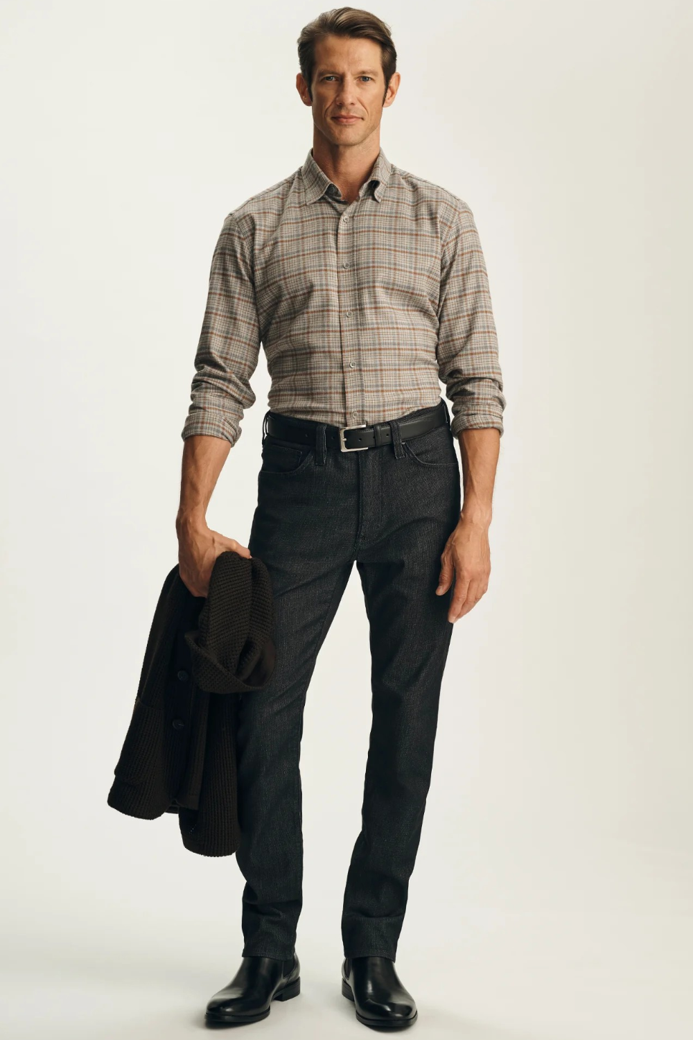 Broderick's Clothing Co. 34 Heritage Courage black straight leg jeans with Thermocool technology on a male model.