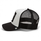 Broderick's Clothing Co. Goorin Bros. black and white trucker hat with mesh back and skull patch side profile view