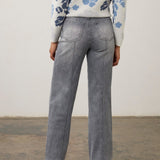 Back view of Broderick's Clothing Co. FDJ Olivia blue-gray wide-leg jeans with pintuck detail and back pockets.