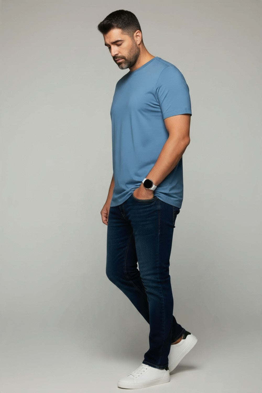 Broderick's Clothing Co. Au Noir C-MAVEN blue modal and mercerized cotton t-shirt worn by a man in jeans and sneakers