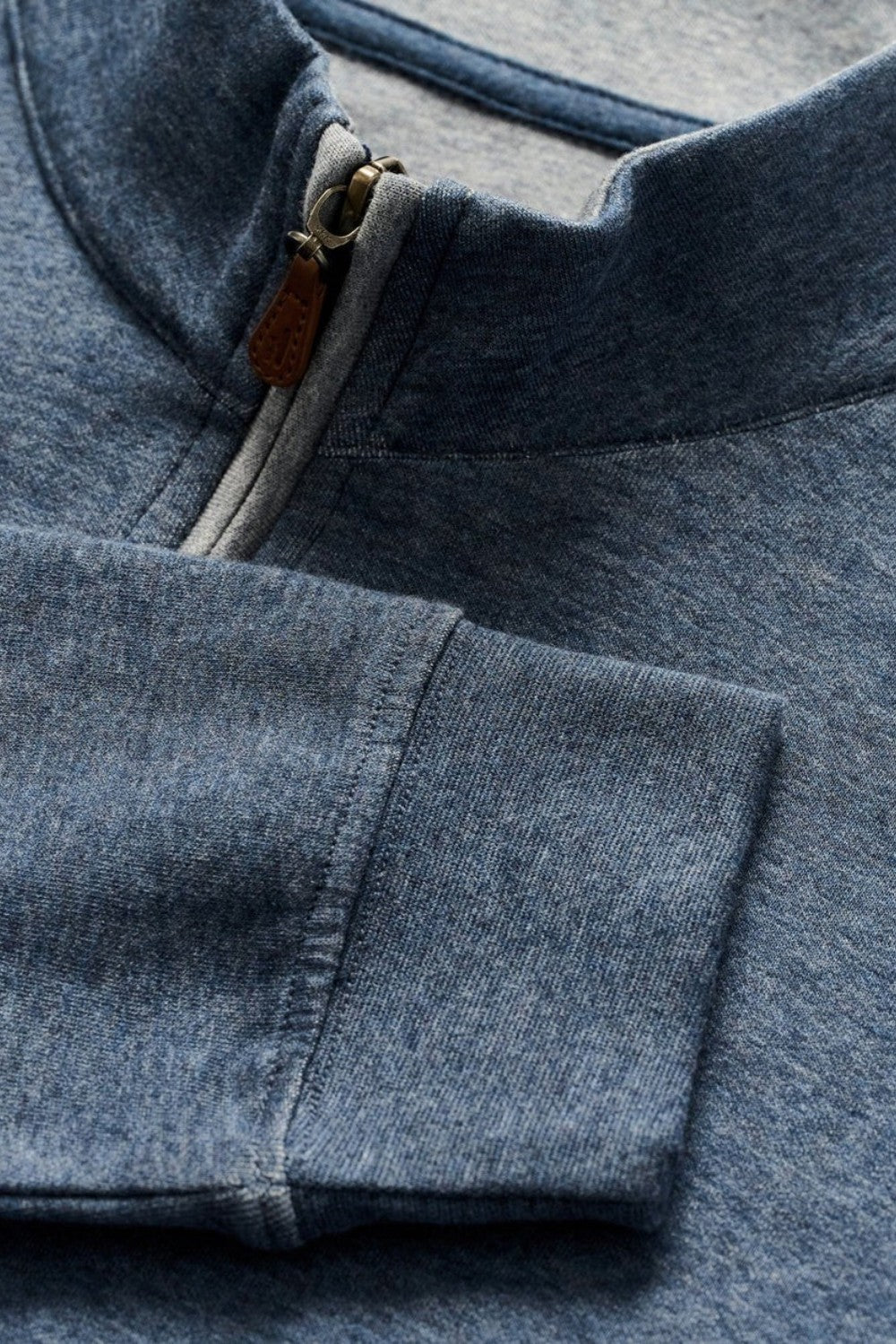 Broderick's Clothing Co. blue cotton-blend quarter-zip pullover with leather zipper pull detail