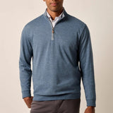 Broderick's Clothing Co. Johnnie-O blue cotton-blend quarter-zip pullover worn by a man on a neutral background.
