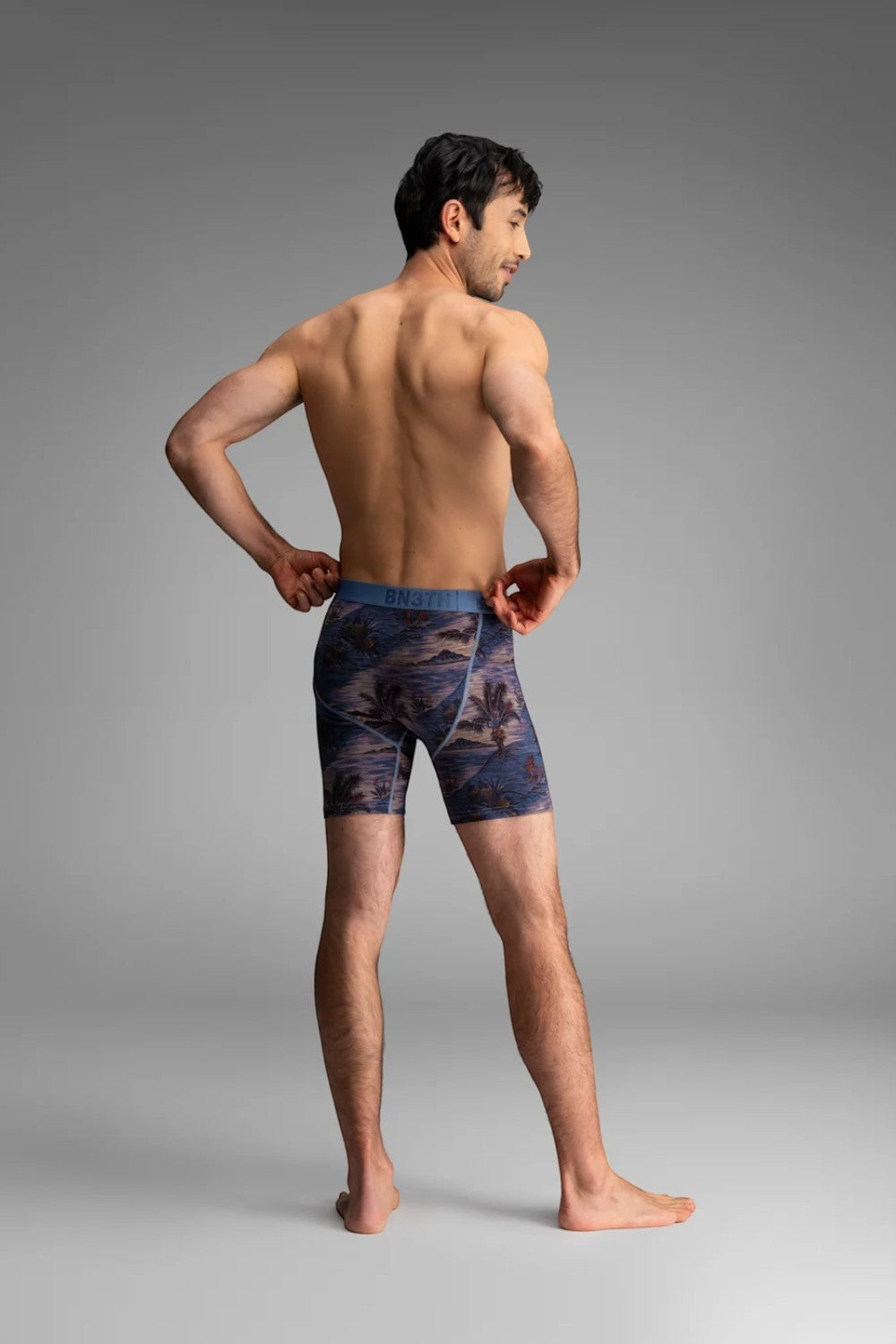 Broderick's Clothing Co. BN3TH Classic Icon boxer brief with tropical landscape print on a model, back view