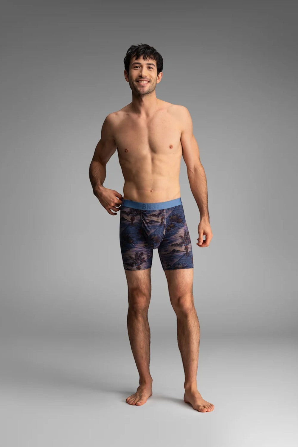 Broderick's Clothing Co. BN3TH Classic Icon boxer briefs with tropical palm print on a smiling male model