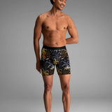 Broderick's Clothing Co. BN3TH Classic Icon boxer brief with a black and gold tropical palm print on a male model.