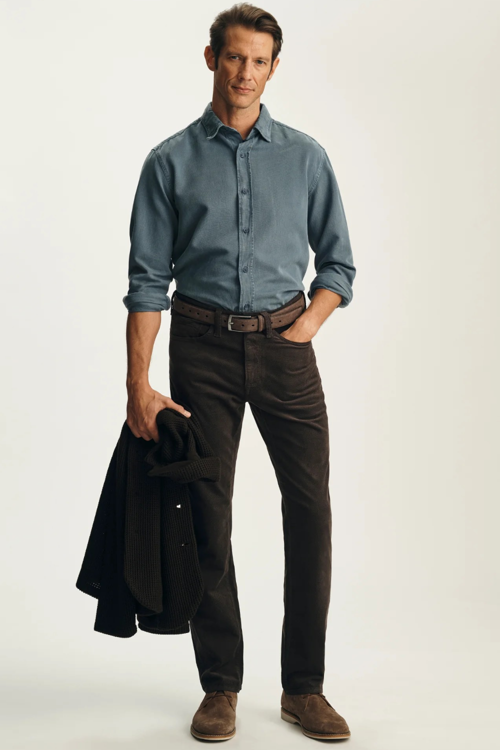 Broderick's Clothing Co. 34 Heritage Charisma brown corduroy-inspired straight leg pants worn by a man