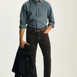 Broderick's Clothing Co. 34 Heritage Charisma brown corduroy-inspired straight leg pants worn by a man