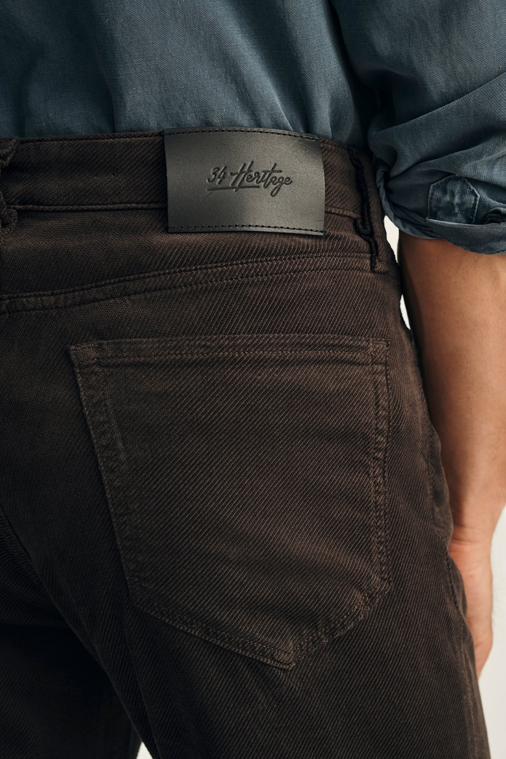 Broderick's Clothing Co. 34 Heritage Charisma brown corduroy-style pants with back pocket and leather brand patch
