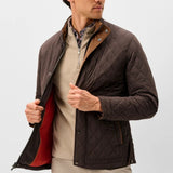 Broderick's Clothing Co. Johnnie-O Juno brown diamond-quilted snap jacket with suede trim worn by a man