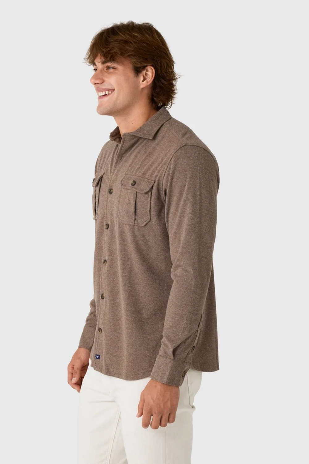 Broderick's Clothing Co. Johnnie-O brown twill overshirt with dual chest pockets worn by a man in profile