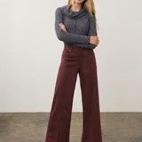 Broderick's Clothing Co. FDJ Olivia wide-leg pants in burgundy euro twill cotton with pintuck detailing on a model