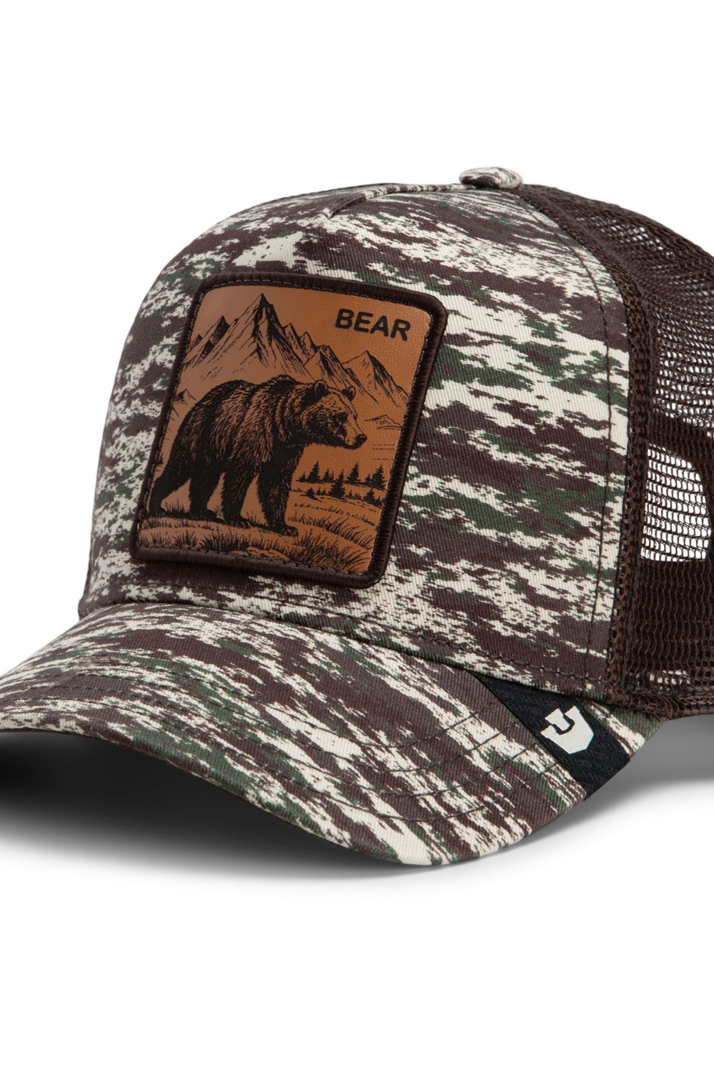 Broderick's Clothing Co. Goorin Bros. camo trucker hat featuring a brown leather bear patch and breathable mesh back.