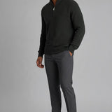 Broderick's Clothing Co. charcoal grey textured cotton quarter-zip sweater worn by a man with grey trousers.