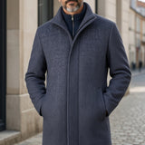Broderick's Clothing Co. 7 Downie St. BATAVIA charcoal wool blend car coat worn by a man on a city street.