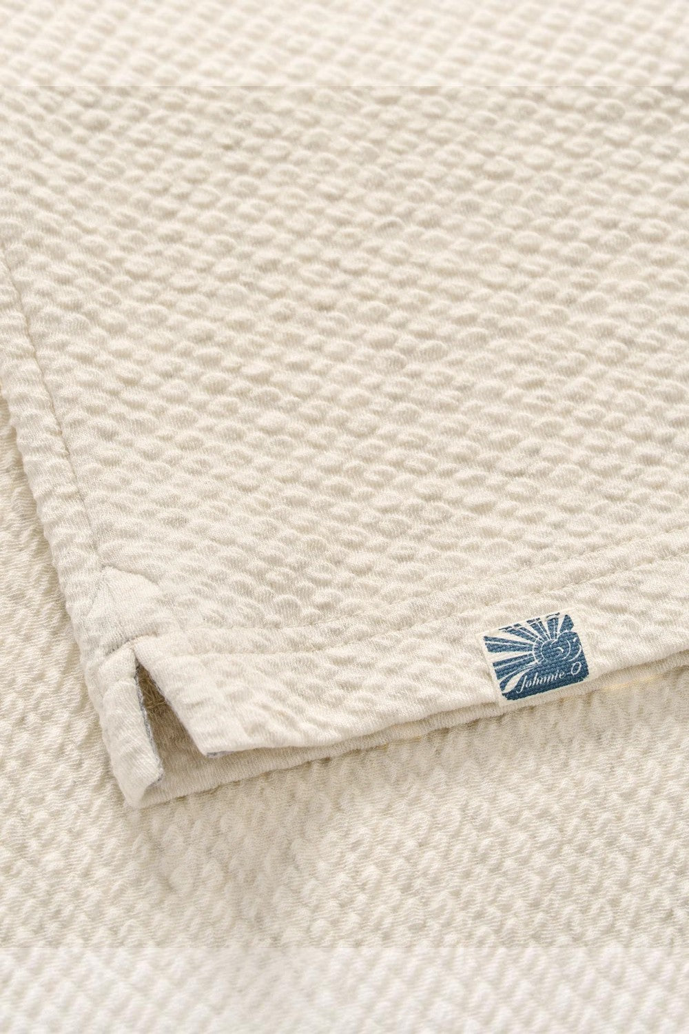 Broderick's Clothing Co. Johnnie-O cream textured cotton-modal knit pullover fabric detail with logo tag