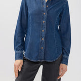 Broderick's Clothing Co. medium-wash blue denim shirt with princess seams and button-down front on a model