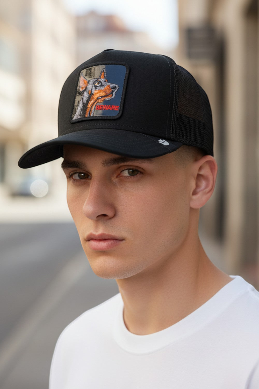 Broderick's Clothing Co. Goorin Bros. Doberman trucker hat in black with a detailed dog patch on a male model
